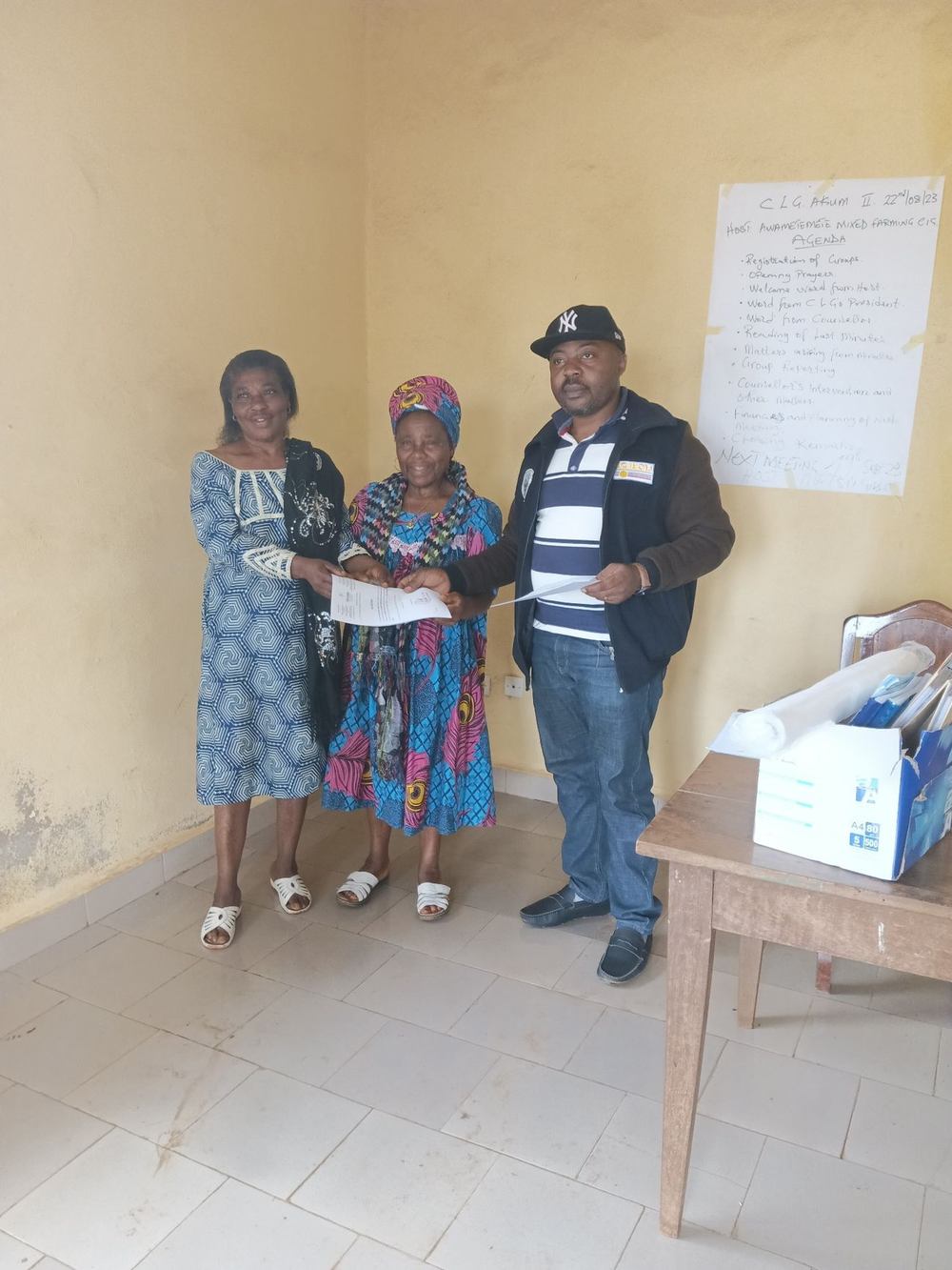 Youth leader receiving recognition at a CENC-Cam program